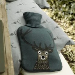 Highland Stag Hot Water Bottle -Sophie Allport AW22 kshw2925 knittedhotwaterbottle HighlandStag Lifestyle high res square