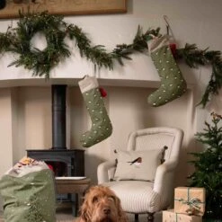 Juniper Berry Wreath 9 Juniper Berry Wreath -Sophie Allport all101590 all101595 lin101401 rw101000ct robin Christmas sack stocking cushion wrapping paper dog lounge portrait lifestyle high res 1 d3cb5a02 b4aa 45ff 9c6d ce0a5f3b41b1