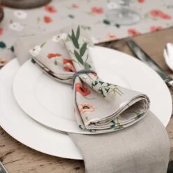 Poppy Meadow Napkins (Set Of 4) -Sophie Allport all103810 all103820 poppy meadow napkin placement outdoor lifestyle high res square