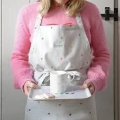 Multicoloured Hearts Adult Apron -Sophie Allport all81250 pt8126 hearts multicoloured adult apron and small printed tray lifestyle high res square