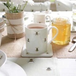 Bees Coloured Mug -Sophie Allport bm3604 bees coloured standard mug lifestyle high res web image