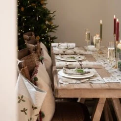 Holly & Berry Fabric Placemats (Set Of 2) -Sophie Allport holly berry table set lifestyle aw22 3 high res square cbba1b30 3e29 4d0a 9d06 5cafb7887581