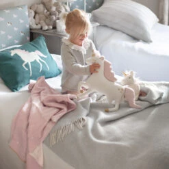 Unicorn Shaped Cushion -Sophie Allport kc55701 unicorn knitted baby blanket lifestyle web 643e5309 3388 48c8 ab12 62feb96241dc