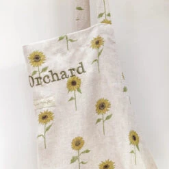 Sunflower Linen Adult Apron -Sophie Allport ss23 sunflower lin108250 apron personalisation detail1 square